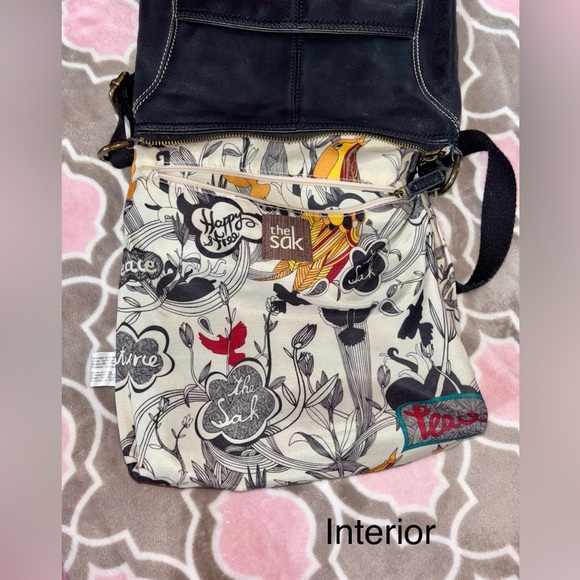 The Sak Black Genuine Leather Tassel Crossbody with Peace Print Interior - Picture 5 of 9